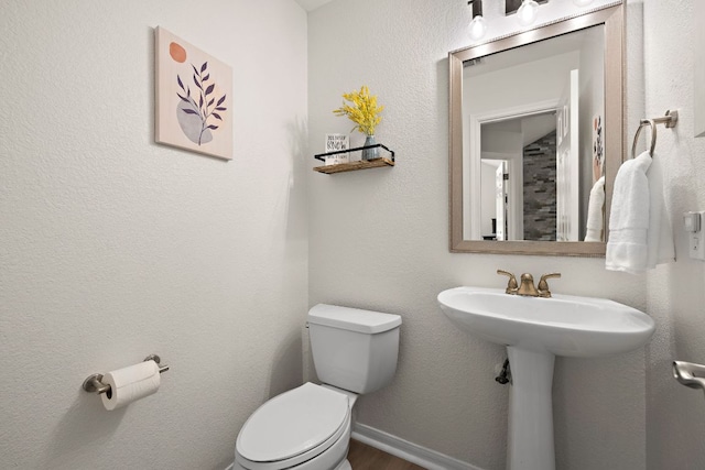 2104 Faldo Ln, Round Rock, TX 78664 - bathroom featuring toilet and a sink