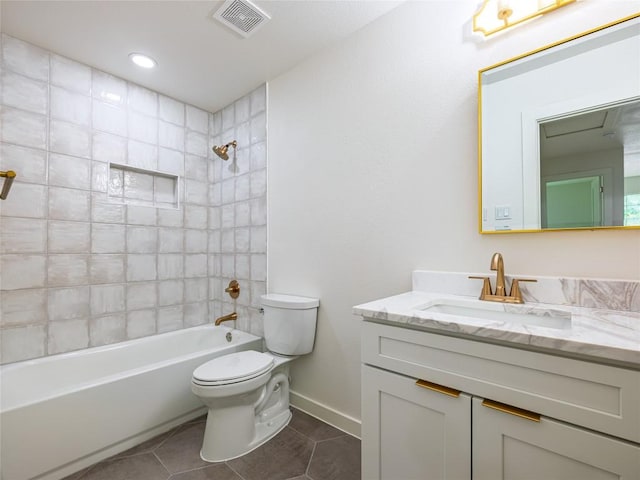 bathroom featuring tile patterned flooring, vanity, toilet, shower / washtub combination, and visible vents