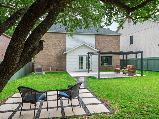 11224 Pickard Ln, Austin, TX 78748 - rear view of property featuring brick siding, french doors, a patio area, and a fenced backyard