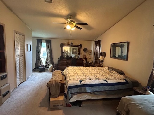 277 Mesquite Dr, Cedar Creek, TX 78612 - bedroom featuring carpet floors, vaulted ceiling, and ceiling fan