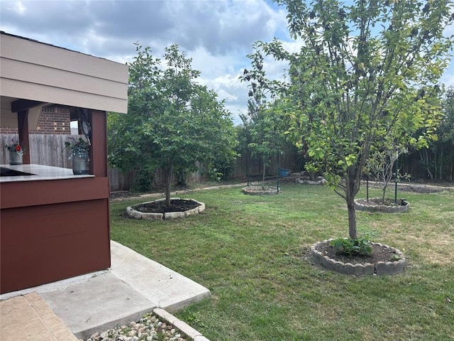 view of yard with fence