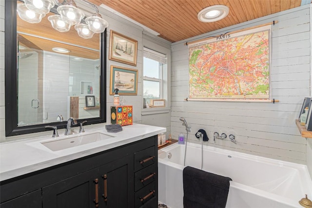 bathroom with a garden tub, vanity, wooden walls, wood ceiling, and a stall shower