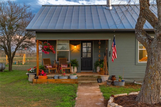 view of outbuilding with a porch