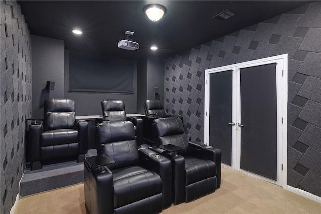 carpeted cinema with visible vents and recessed lighting