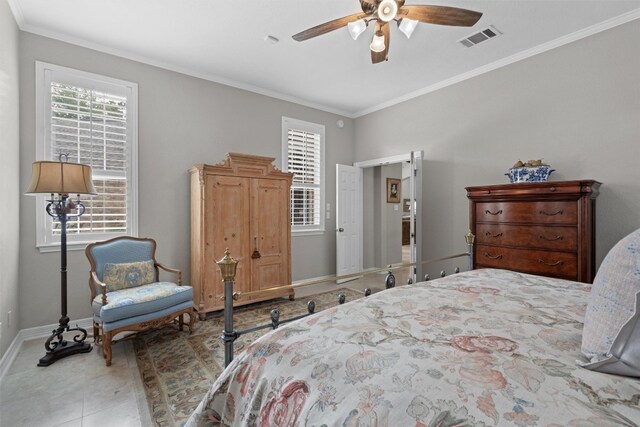 1901 Plantation Ct, Round Rock, TX 78681 - bedroom with crown molding, baseboards, and ceiling fan