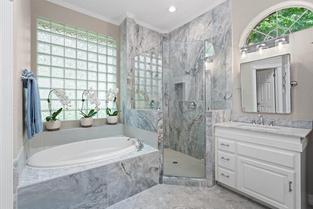 1901 Plantation Ct, Round Rock, TX 78681 - bathroom featuring ornamental molding, a garden tub, a stall shower, and vanity
