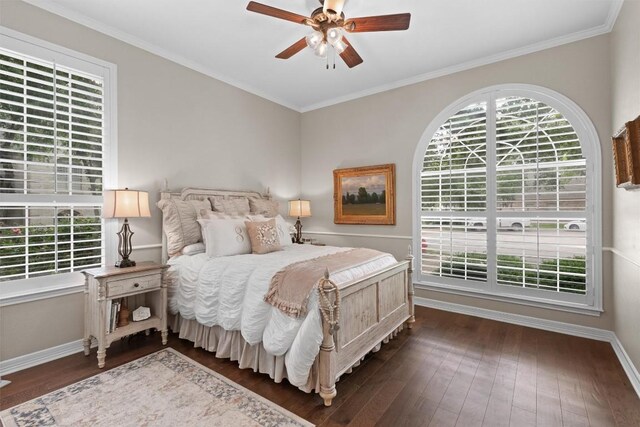 1901 Plantation Ct, Round Rock, TX 78681 - bedroom featuring dark wood-type flooring, baseboards, crown molding, and ceiling fan