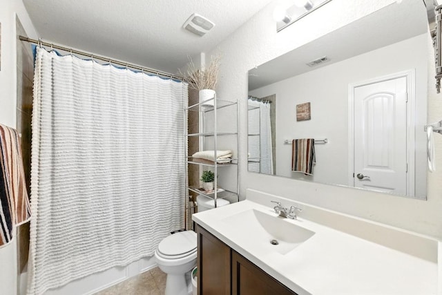 full bathroom featuring visible vents, tile patterned floors, toilet, and vanity