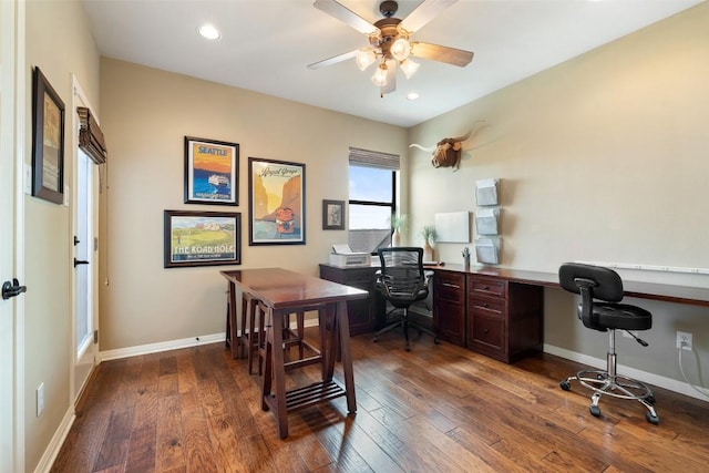 6006 Seville Dr, Austin, TX 78724 - home office with dark wood finished floors, a ceiling fan, and recessed lighting