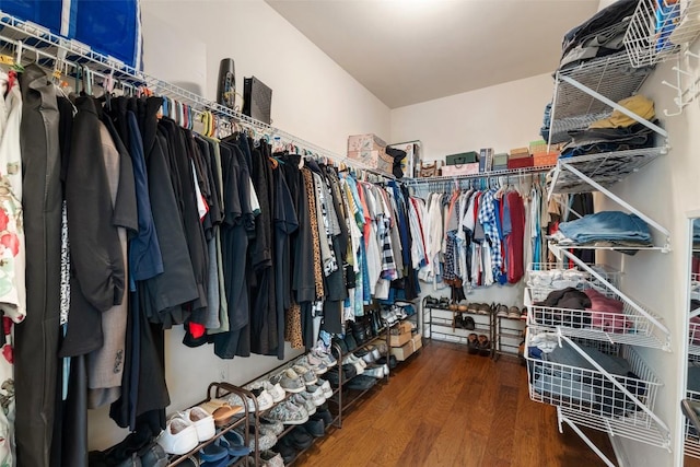 6006 Seville Dr, Austin, TX 78724 - walk in closet featuring wood finished floors
