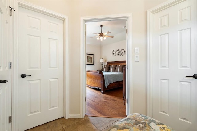 6006 Seville Dr, Austin, TX 78724 - corridor featuring light tile patterned floors and baseboards