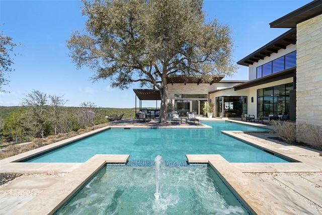 8701 Acuarela Ct, Austin, TX 78735 - swimming pool with an in-ground hot tub and a patio area