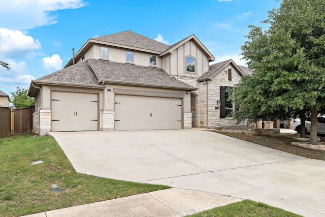 view of front facade with concrete driveway, stucco siding, stone siding, and a garage