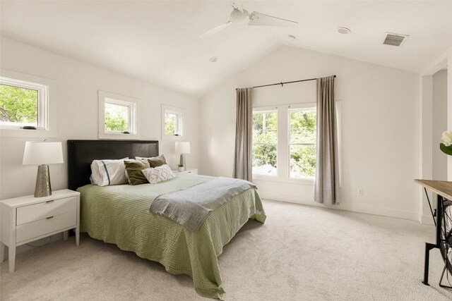 4903 Shoal Creek Blvd, Austin, TX 78756 - bedroom featuring vaulted ceiling, a ceiling fan, and light colored carpet