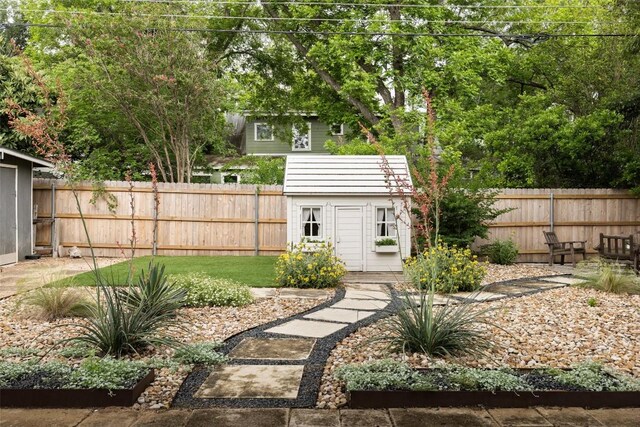 4903 Shoal Creek Blvd, Austin, TX 78756 - fenced backyard with a storage unit