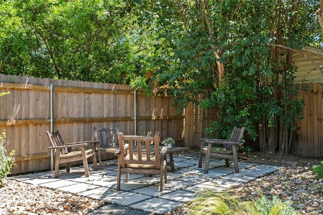 4903 Shoal Creek Blvd, Austin, TX 78756 - fenced backyard with a patio area