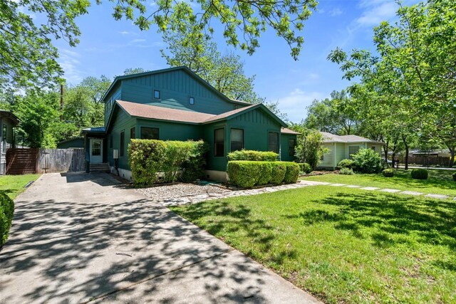 4903 Shoal Creek Blvd, Austin, TX 78756 - view of front of property featuring board and batten siding and driveway