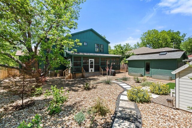 4903 Shoal Creek Blvd, Austin, TX 78756 - back of house with a sunroom and board and batten siding