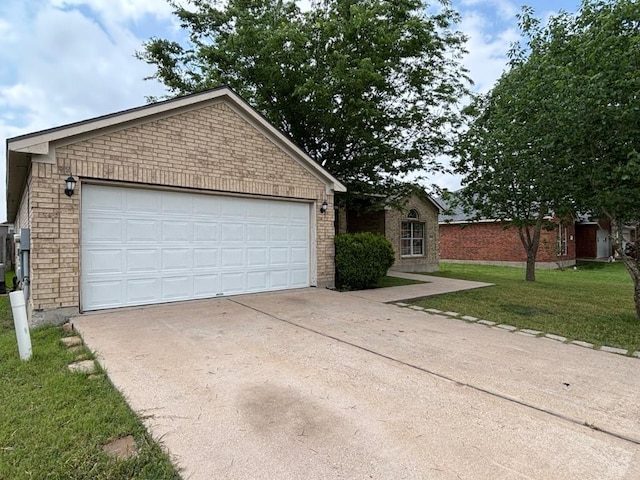 ranch-style home with brick siding, a garage, a front lawn, and concrete driveway