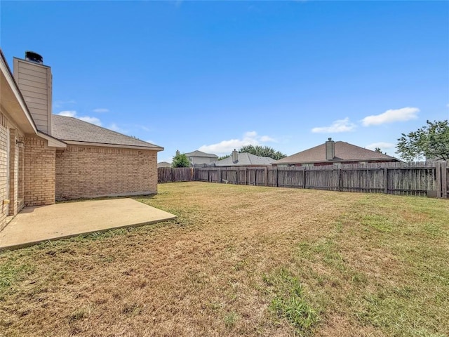 1614 Prickly Pear St, Lockhart, TX 78644 - fenced backyard with a patio
