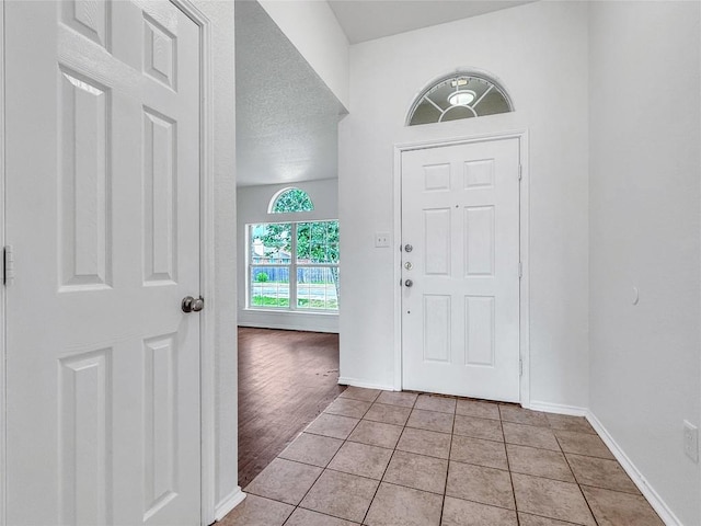 1614 Prickly Pear St, Lockhart, TX 78644 - entryway featuring baseboards and light tile patterned flooring