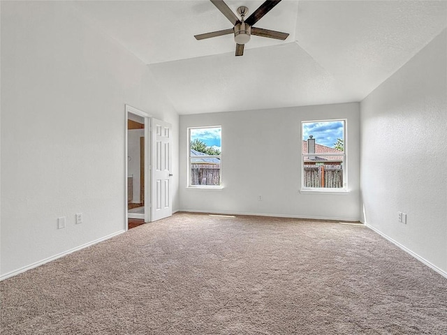 1614 Prickly Pear St, Lockhart, TX 78644 - spare room with ceiling fan, carpet flooring, and vaulted ceiling