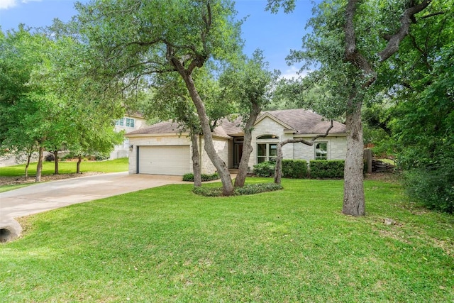 ranch-style house with an attached garage, driveway, and a front lawn