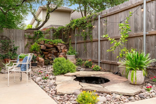 1424 Gracy Dr, Austin, TX 78758 - fenced backyard featuring a patio