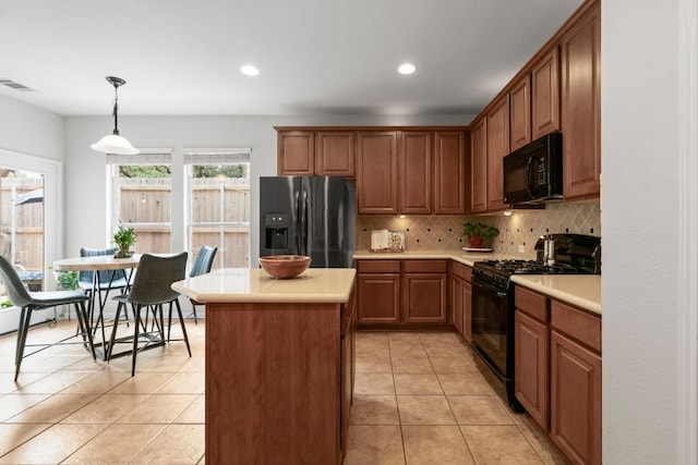 1424 Gracy Dr, Austin, TX 78758 - kitchen featuring black appliances, light countertops, backsplash, recessed lighting, and light tile patterned floors