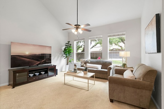 living room with carpet flooring, ceiling fan, and high vaulted ceiling