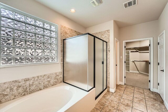 404 Scarlet Maple Dr, Cedar Park, TX 78613 - full bath featuring visible vents, a shower stall, and a walk in closet