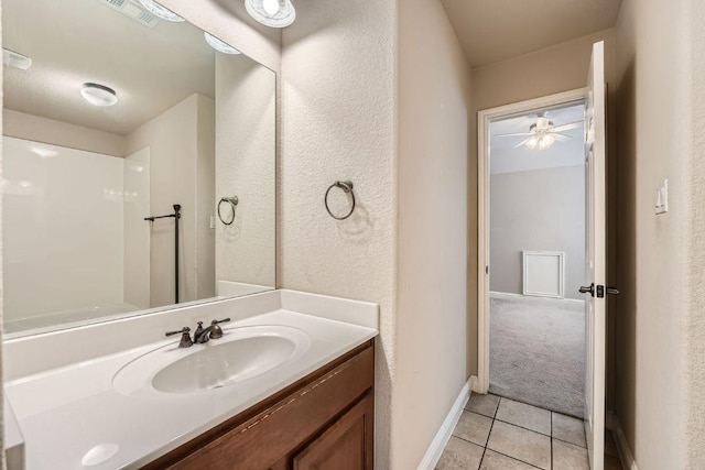 404 Scarlet Maple Dr, Cedar Park, TX 78613 - bathroom with a ceiling fan, visible vents, tile patterned floors, baseboards, and vanity