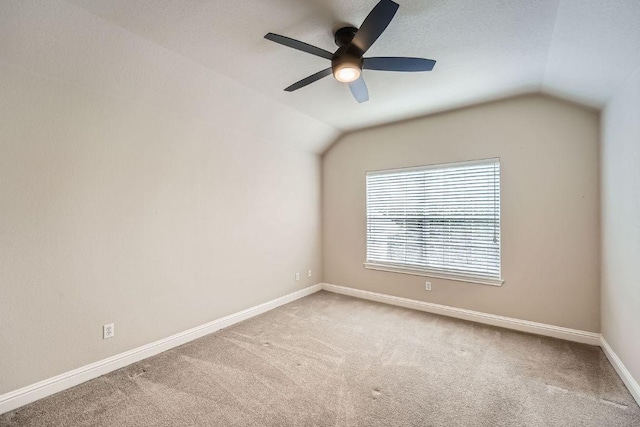 404 Scarlet Maple Dr, Cedar Park, TX 78613 - spare room with carpet floors, a ceiling fan, baseboards, and vaulted ceiling
