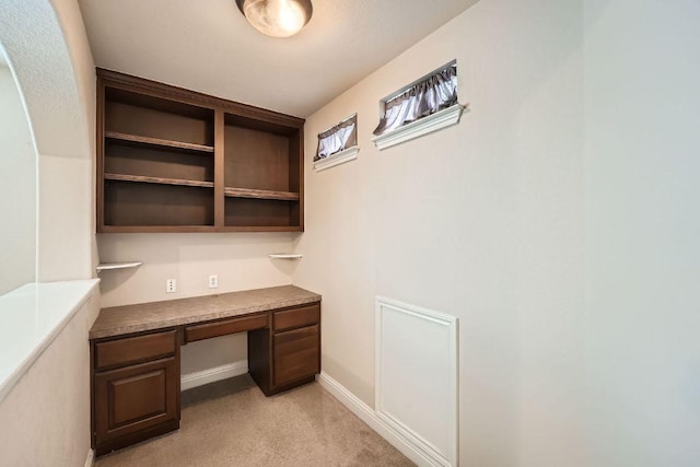 404 Scarlet Maple Dr, Cedar Park, TX 78613 - unfurnished office featuring built in study area, baseboards, and light carpet