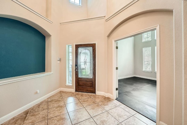 404 Scarlet Maple Dr, Cedar Park, TX 78613 - entryway with tile patterned floors, baseboards, and a high ceiling