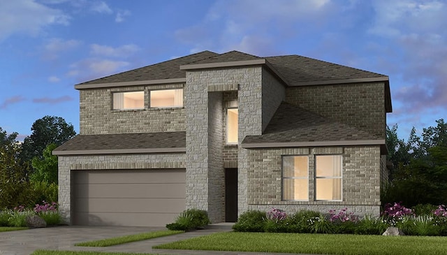 exterior space featuring an attached garage, driveway, and stone siding