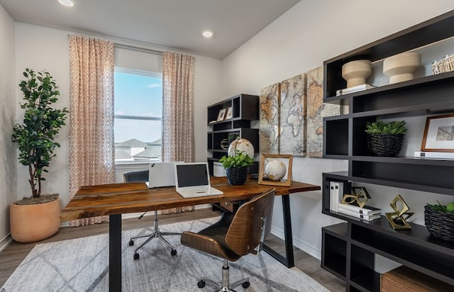 office area with recessed lighting, baseboards, and wood finished floors