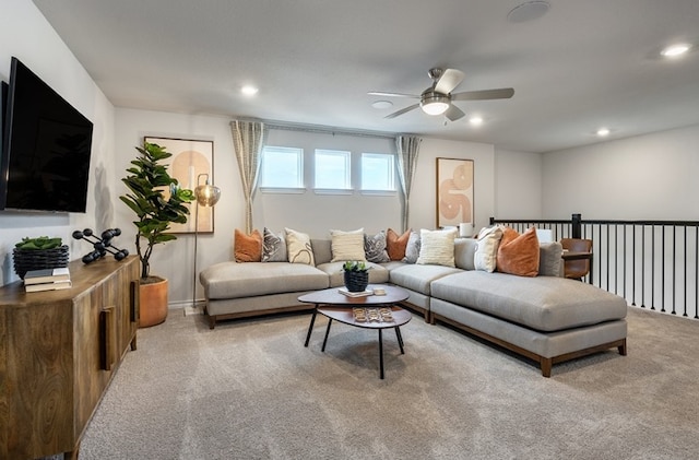 living area with ceiling fan, carpet, and recessed lighting