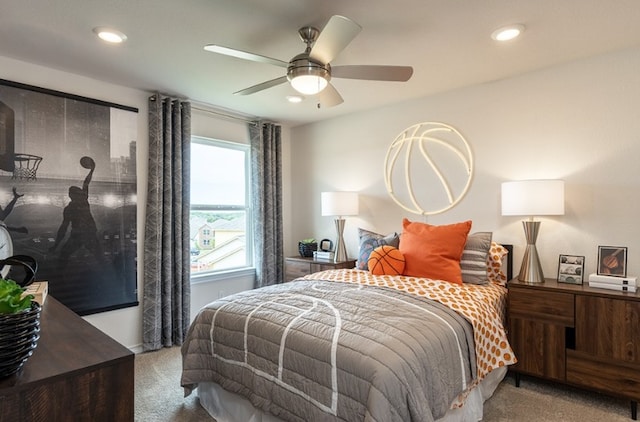 carpeted bedroom featuring recessed lighting and a ceiling fan