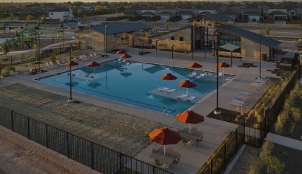 view of pool featuring fence