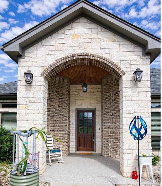 1066 Vista Dr, Salado, TX 76571 - view of exterior entry with stone siding and brick siding