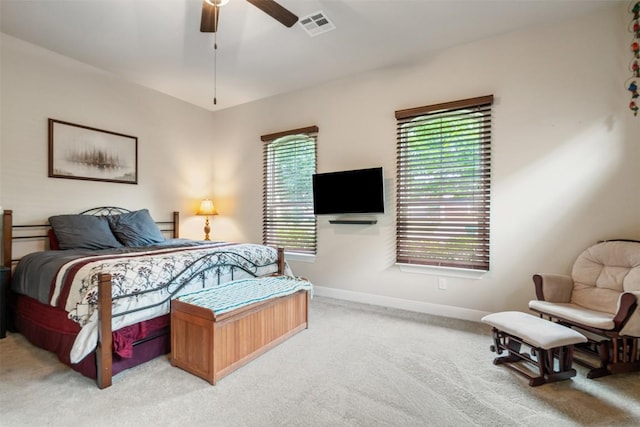 2917 Windy Vane Dr, Pflugerville, TX 78660 - bedroom featuring light carpet, baseboards, and a ceiling fan