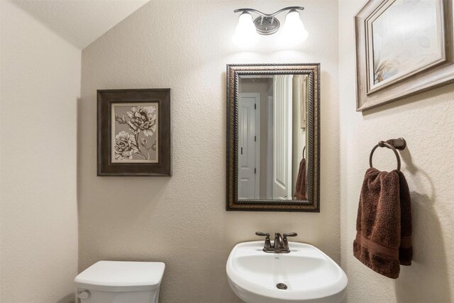 bathroom featuring a sink and toilet