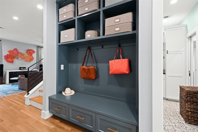 mudroom featuring light wood-style floors, recessed lighting, and visible vents