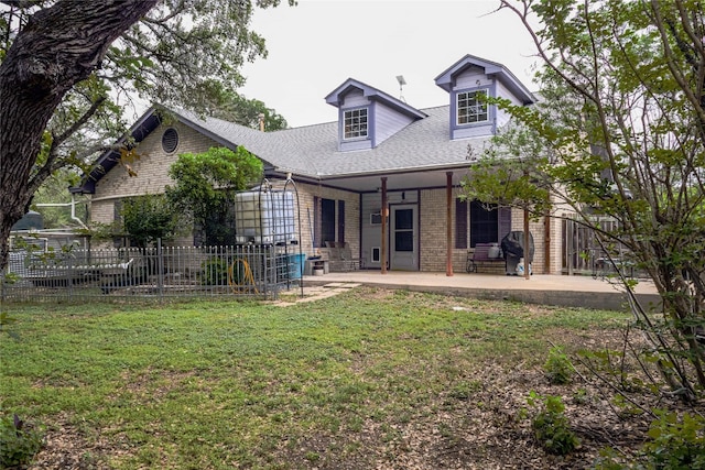 1751 County Road 255, Georgetown, TX 78633 - rear view of property featuring brick siding and a shingled roof