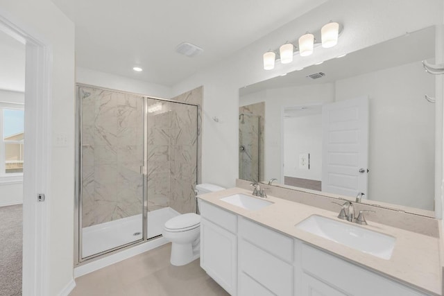 200 Lucky Texan Rd, Jarrell, TX 76537 - bathroom featuring a marble finish shower, double vanity, and recessed lighting