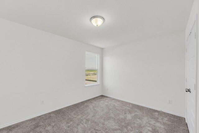 200 Lucky Texan Rd, Jarrell, TX 76537 - unfurnished room featuring carpet floors and baseboards
