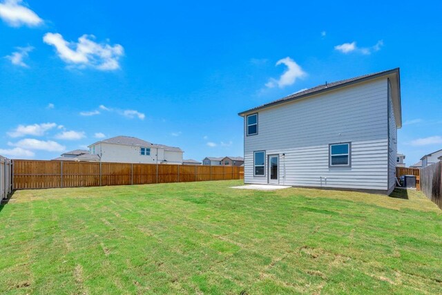 200 Lucky Texan Rd, Jarrell, TX 76537 - rear view of house with a patio area and a fenced backyard