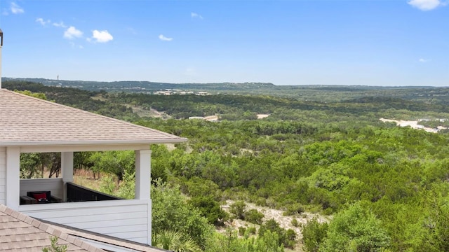 property view of mountains with a wooded view