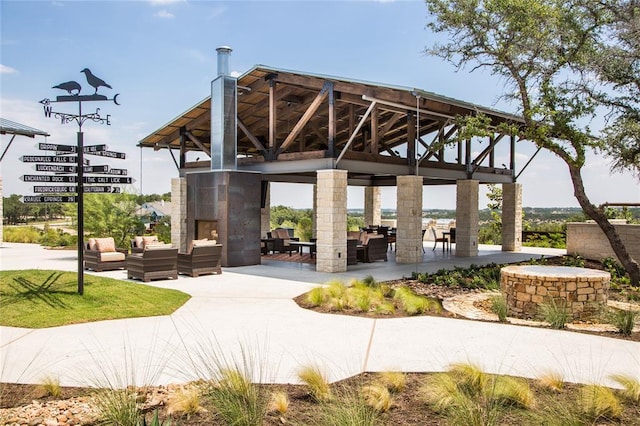 view of community with a gazebo and an outdoor living space